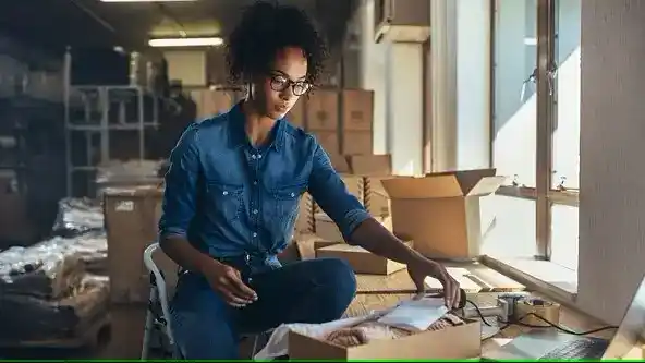 Woman Preparing a Shipment