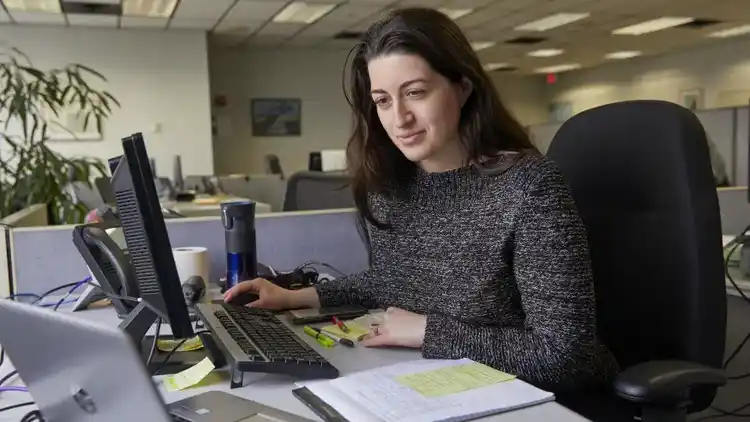 Woman at her computer